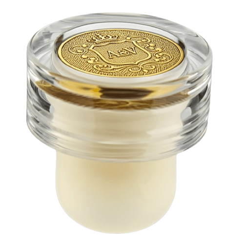 Closure featuring metallic medallion insert on the top